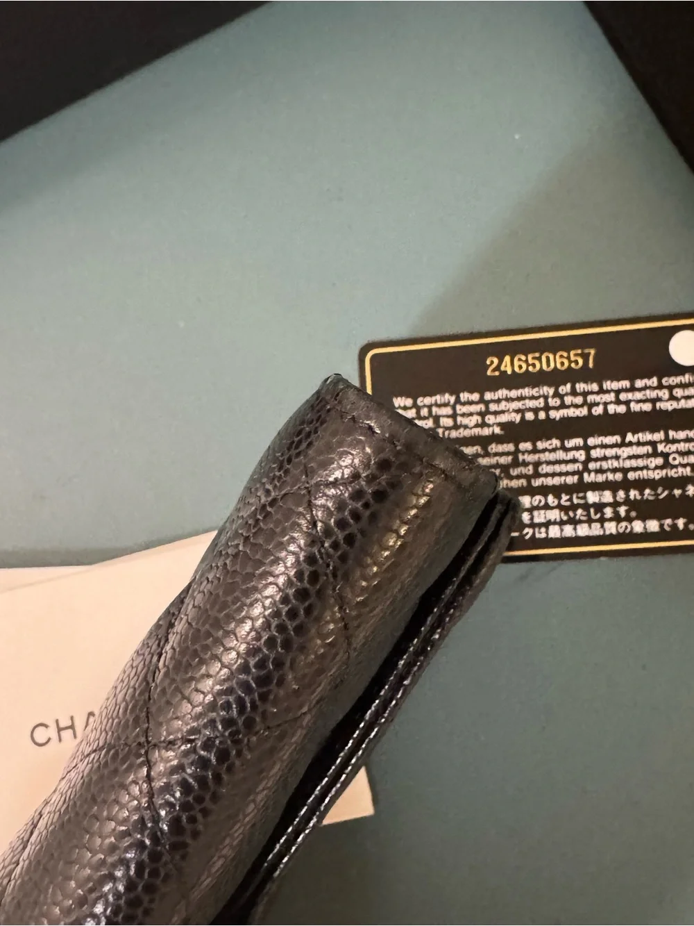 CHANEL Black Quilted Caviar Leather Wallet with Gold CC Lock